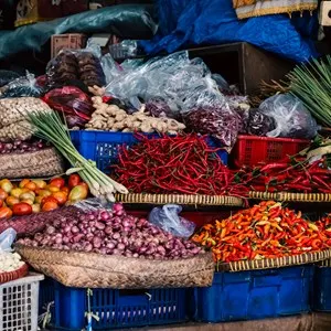 Colorful collection of vegetables, spices, nuts and lemon grass for sale in Pasar Badung, the main Denpasar city market in Bali, Indonesia