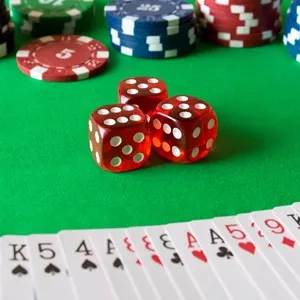 Dice, poker chips and playing cards