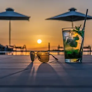 cocktail sunglasses in sunset