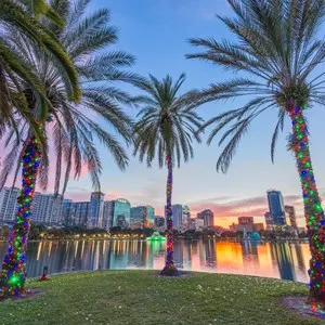 Orlando, Florida, USA downtown skyline at Eola Lake
