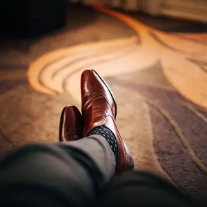 man in leather shoes