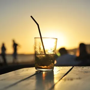 Mojito cocktail at sunset in a beach bar