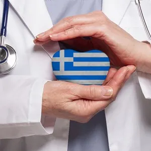 Greek doctor holding heart with flag of Greece background.