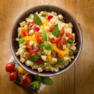 vegetarian couscous with tofu capsicum tomatoes mint and capers