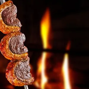Steak rotisserie at the steakhouse, sliced picanha