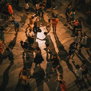 people dancing in pairs at El Observatorio, San Jose, Costa Rica