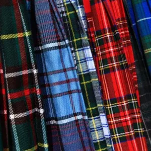 An assortment of colourful Scottish tartan kilts.