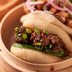 Gua bao, steamed buns with pork belly and vegetable. Asian cuisine