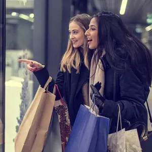 Two women in a shopping centre