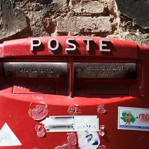 A red post box in Italy