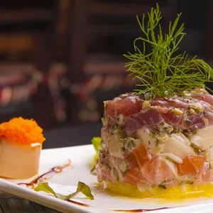 Salmon and tuna ceviche with caviar. Peruvian Gourmet fish Meal