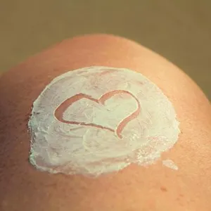 heart shape drawn in sunscreen