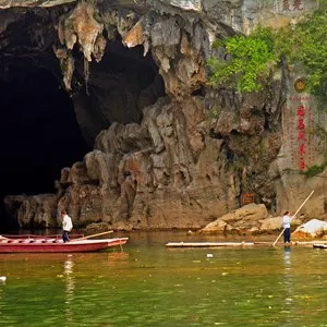 Crown Cave is a 12 km long water-eroded cave. It is a wonderland of various stalactite, stone pillars and rock formations.
