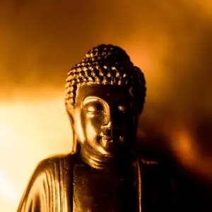 Closeup face of Buddha statue in Chinese style