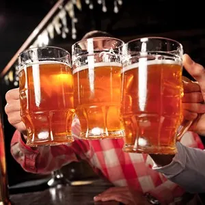 Friends in a pub clinking beers