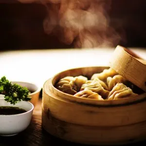 dumplings in a steamer basket
