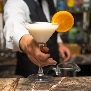 Barman at work, preparing cocktails.