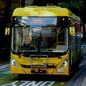A battery electric bus waiting at the traffic lights