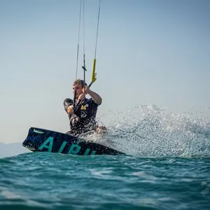 man doing kitesurfing