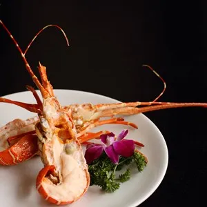 Grilled Lobster Tails on white plate