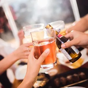 Friends having beer at a bar in Gothenburg, Sweden