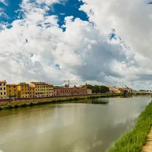 Ancient buildings along the river in Pisa