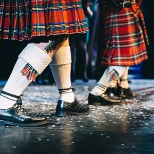 feet of Scottish dancers on stage