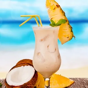 Summer drink with blur beach on background