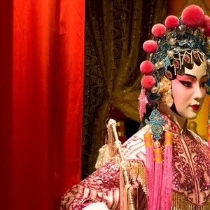 chinese opera dummy and red cloth as text space ,it is a toy,not real man