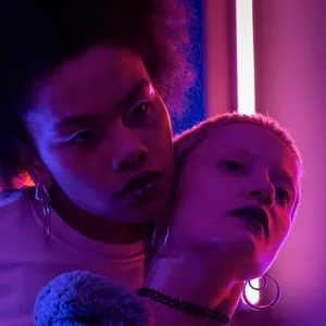 two women in neon lights