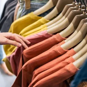Close up of women look product of clothes in shopping mall.