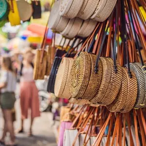 Famous Balinese rattan eco bags in a local souvenir market in Bali, Indonesia