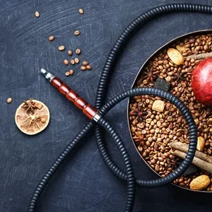 Shisha hookah with with coffee beans and pomegranate