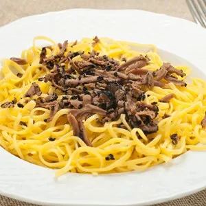 Pasta typical of Piedmont called tajarin with truffle