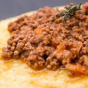 Polenta with bolognese soup