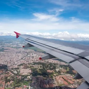 Aerial view of Bogota from the window of a plane on a sunny day. Colombia .