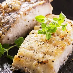 fish fillet fried in the pan
