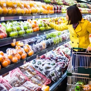 Young woman shopping in the supermarket
