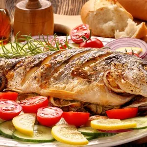 Roasted dorada fish with vegetables