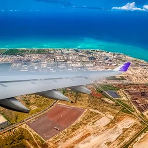 Approaching Honolulu International Airport. The plane banks slightly to align itself for the final descend
