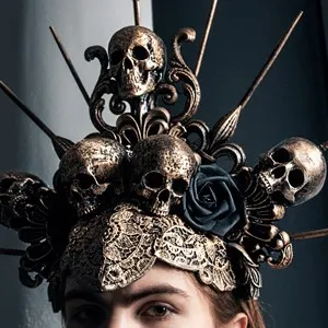man wearing a crown of sculls
