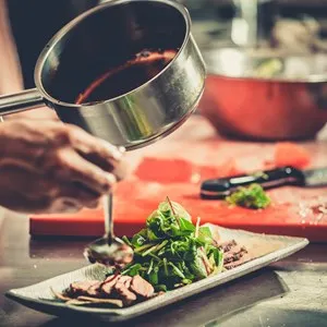 Chef finishing his plate