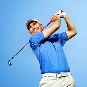 golfer shooting a golf ball