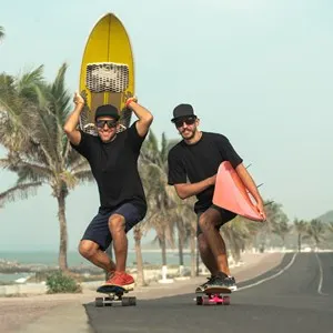 Surfers having fun with surfboards