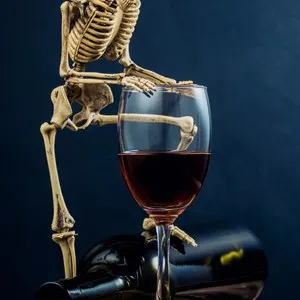 drunkard human skeleton with wine glass