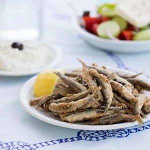 Fried anchovies, gavros in greek taverna
