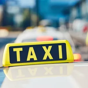 yellow taxi sign