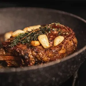 Tomahawk Steak with Surf and Turf Shrimp