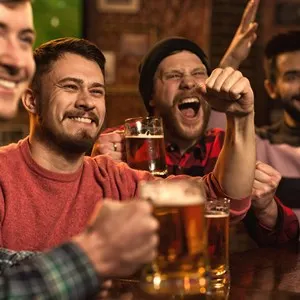 Men watching a football match at a sports bar - San Francisco, California