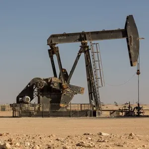 Crude oil drilling well pumping the black gold out of the soil of the Sultanate of Oman in the middle east